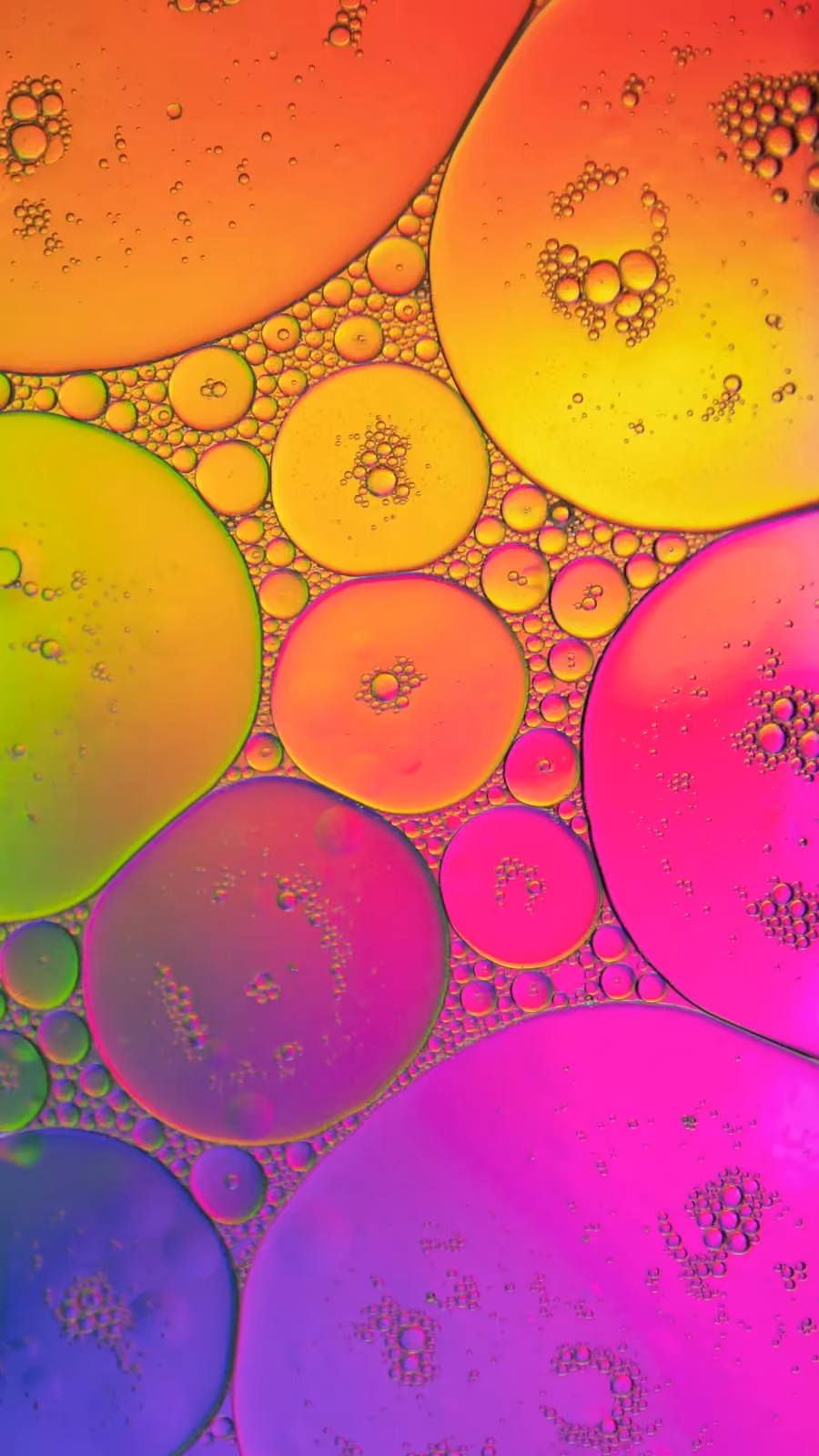 Colour under a microscope, magenta, orange and green